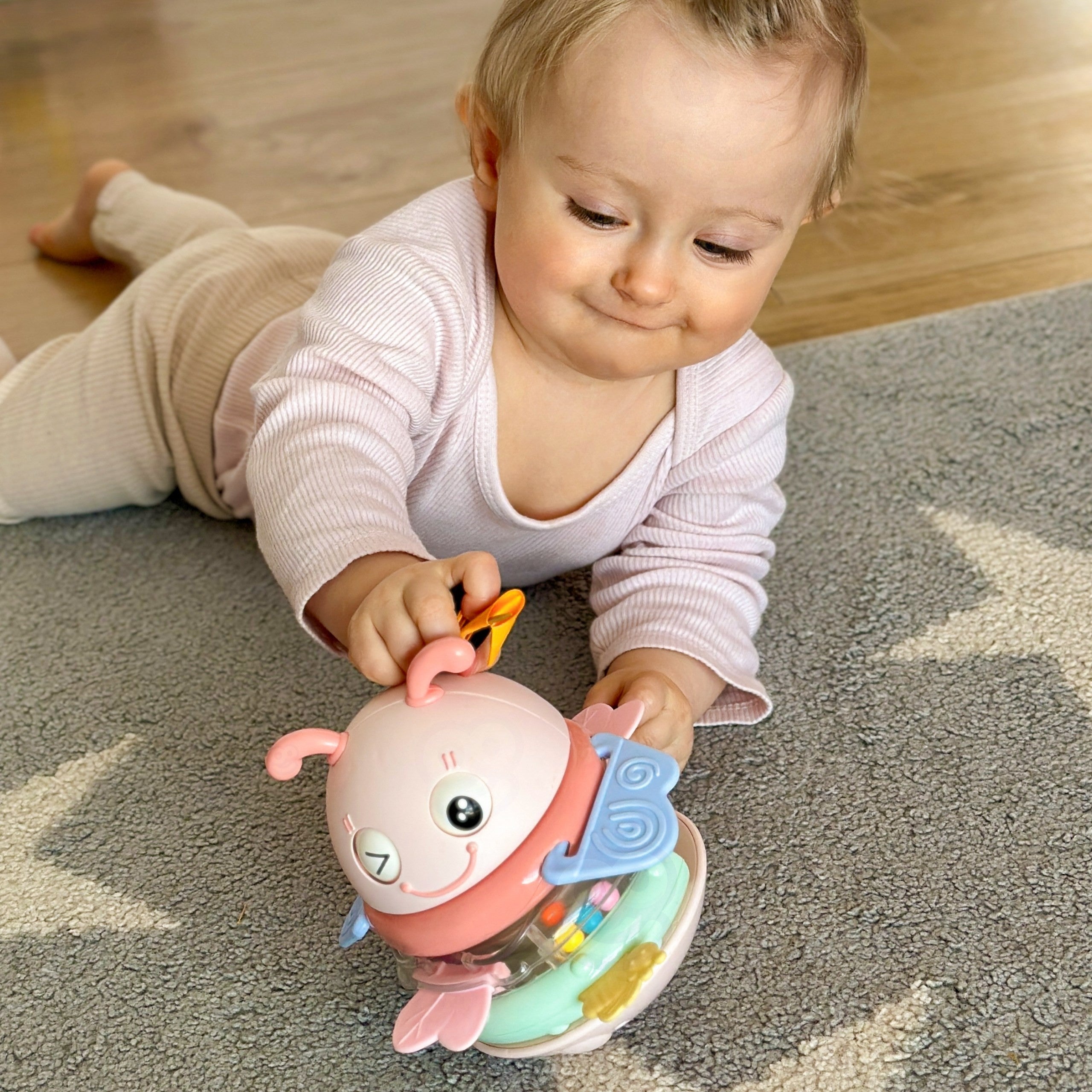 WOOPIE Baby Wańka Wstańka Zabawka Sensoryczna 2w1 Grzechotka Gryzak Różowa